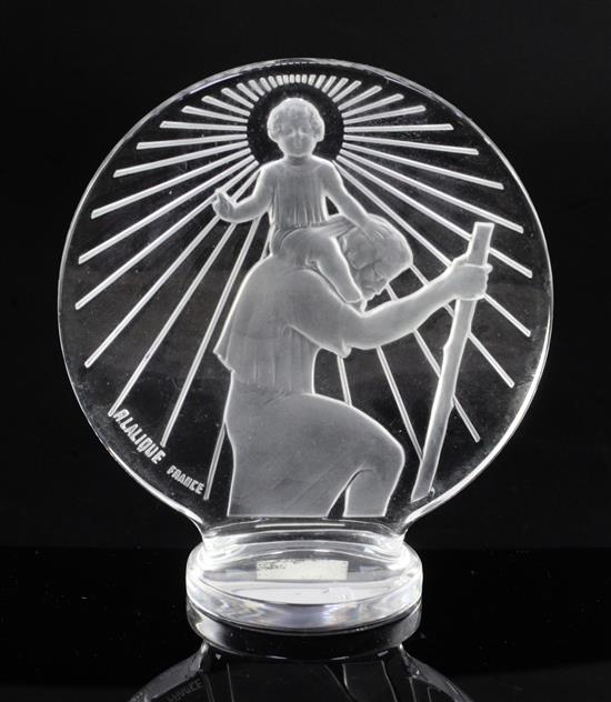 Sainte-Christophe/St. Christopher. A glass mascot by René Lalique, introduced on 1/3/1928, No.10930 Height 11.5cm.